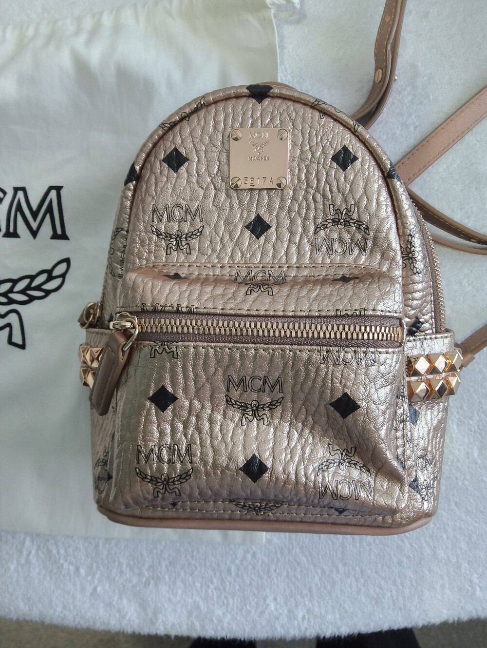 MCM Metallic Rose Gold Mini Backpack with Stud Accents